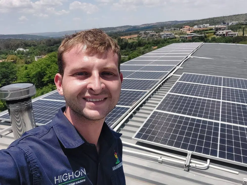 Luvstuen Solutions team member on solar installation project